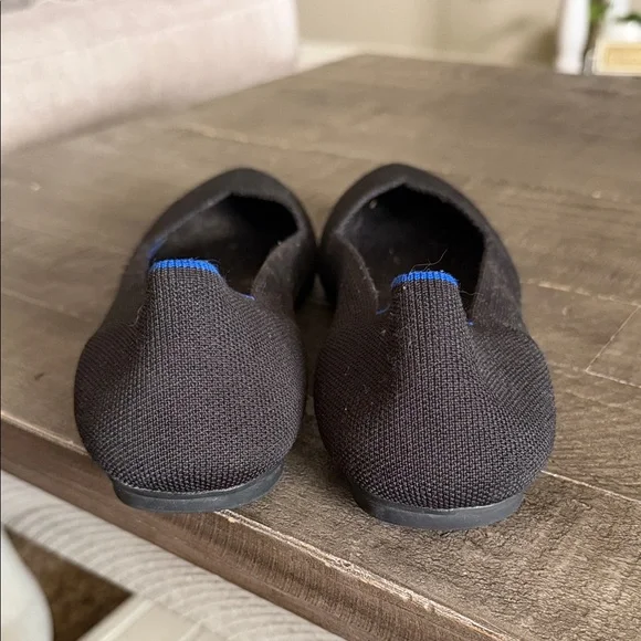 Rothy’s Stylish Black Flats with Blue Accents - Picture 2 of 7
